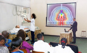 students-classroom-looking-at-chakras