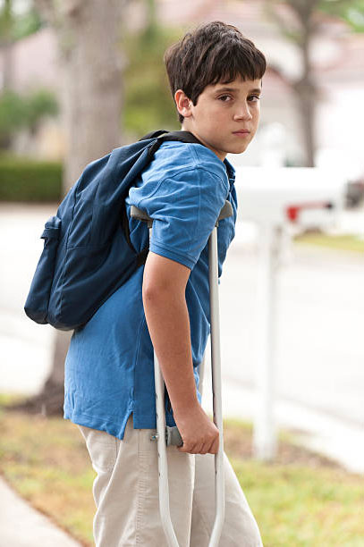 young-boy-using-crutches-4-post