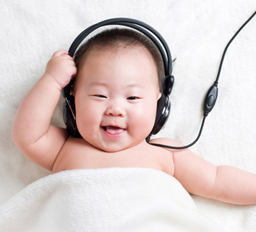 child in head phones