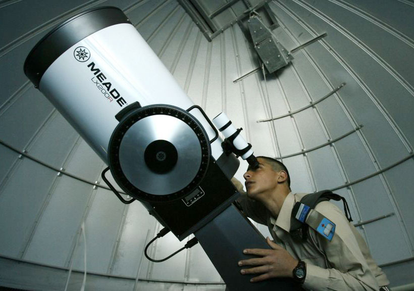 man-looking-through-telescope-4-post