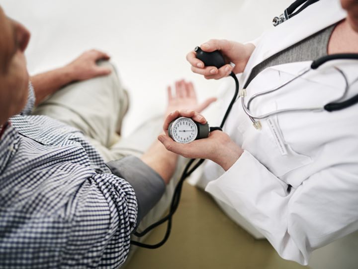 physician monitoring vital signs