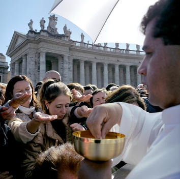 priest with followers