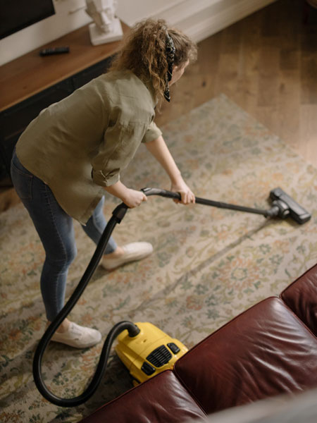 10-woman-vacuuming
